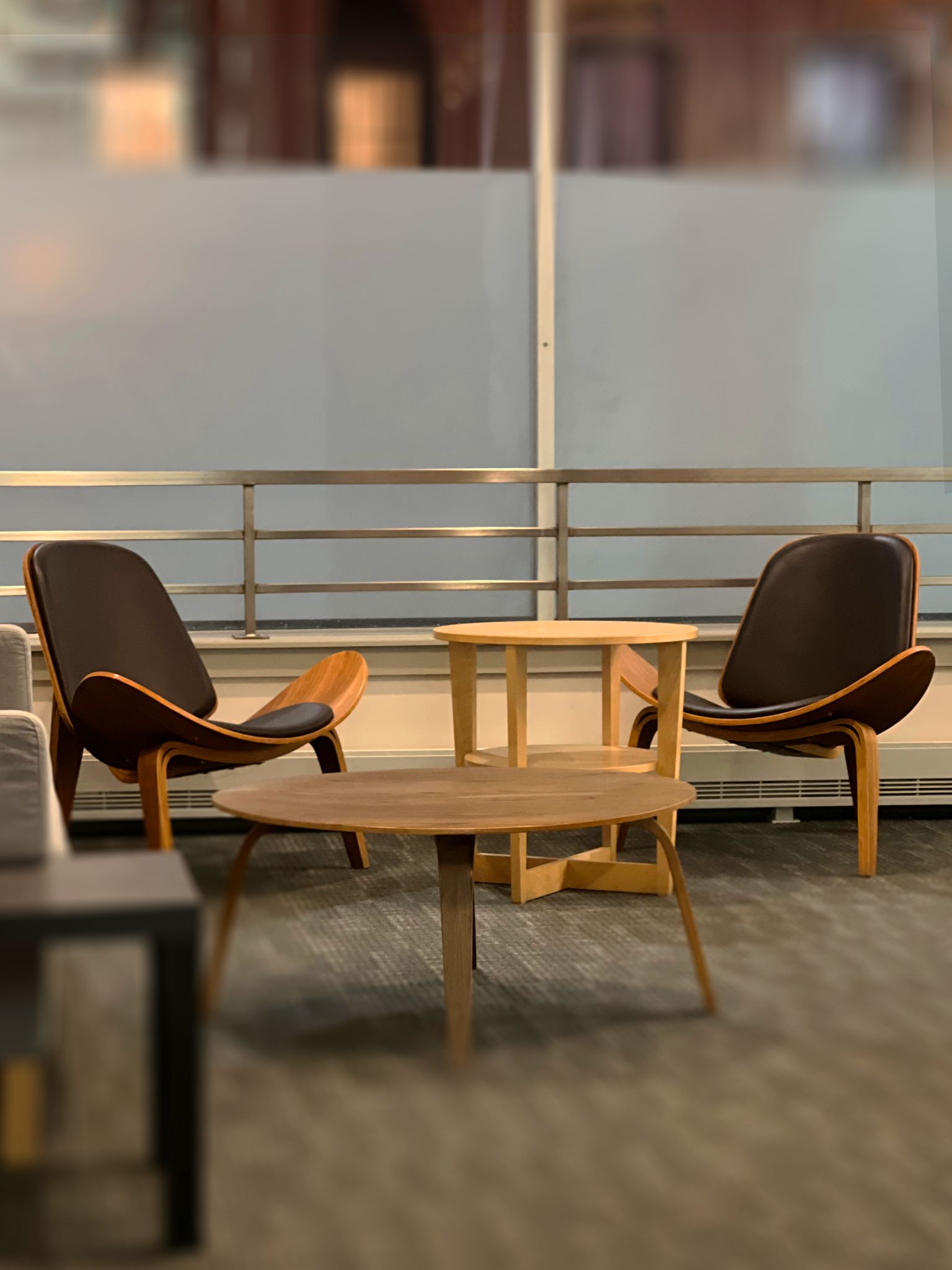 Comfortable lounge seating area with modern chairs and coffee table